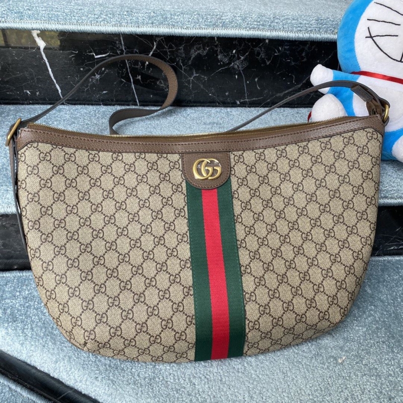 G*u*i top handle bags